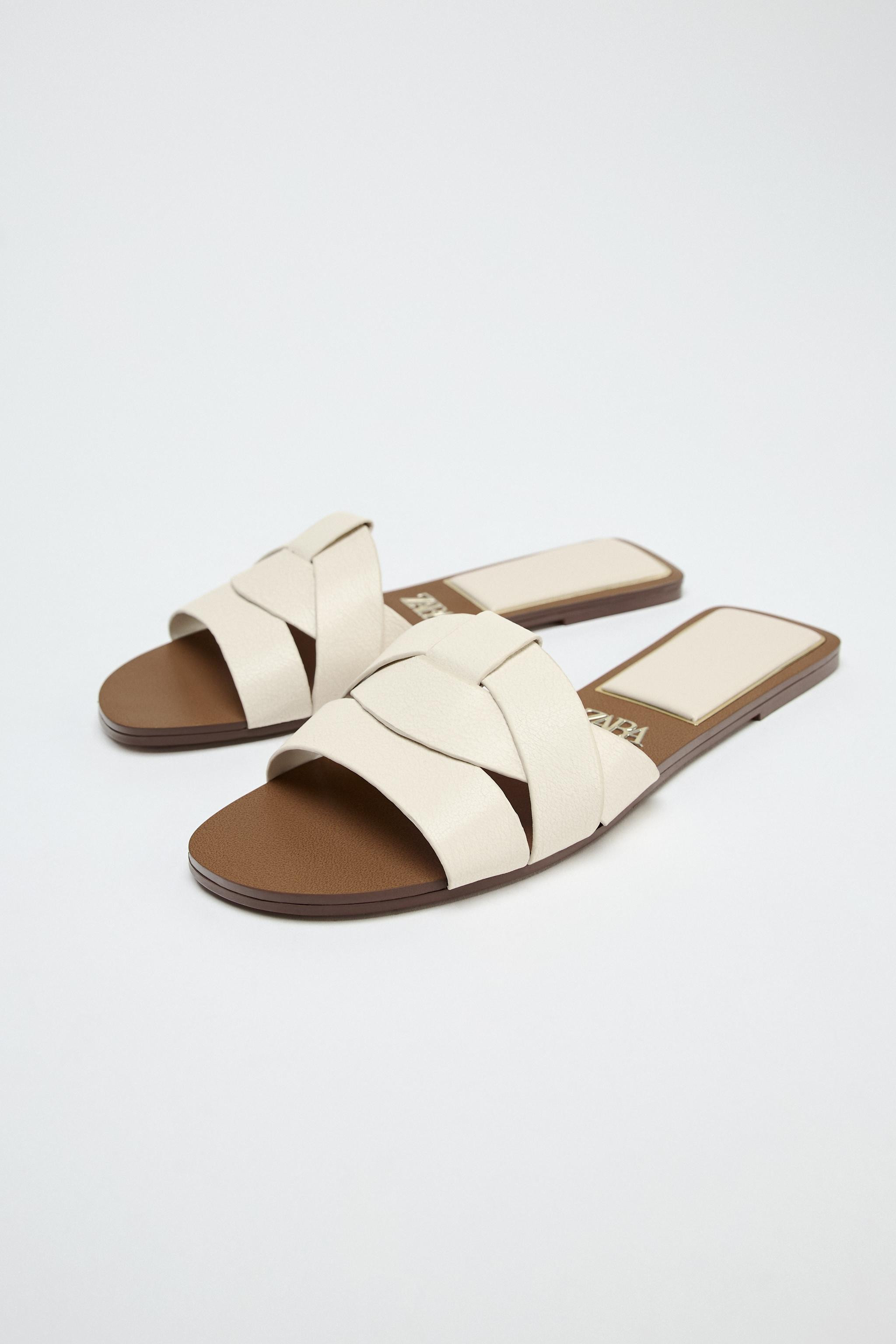 FLAT CROSSED LEATHER SANDALS | Zara US