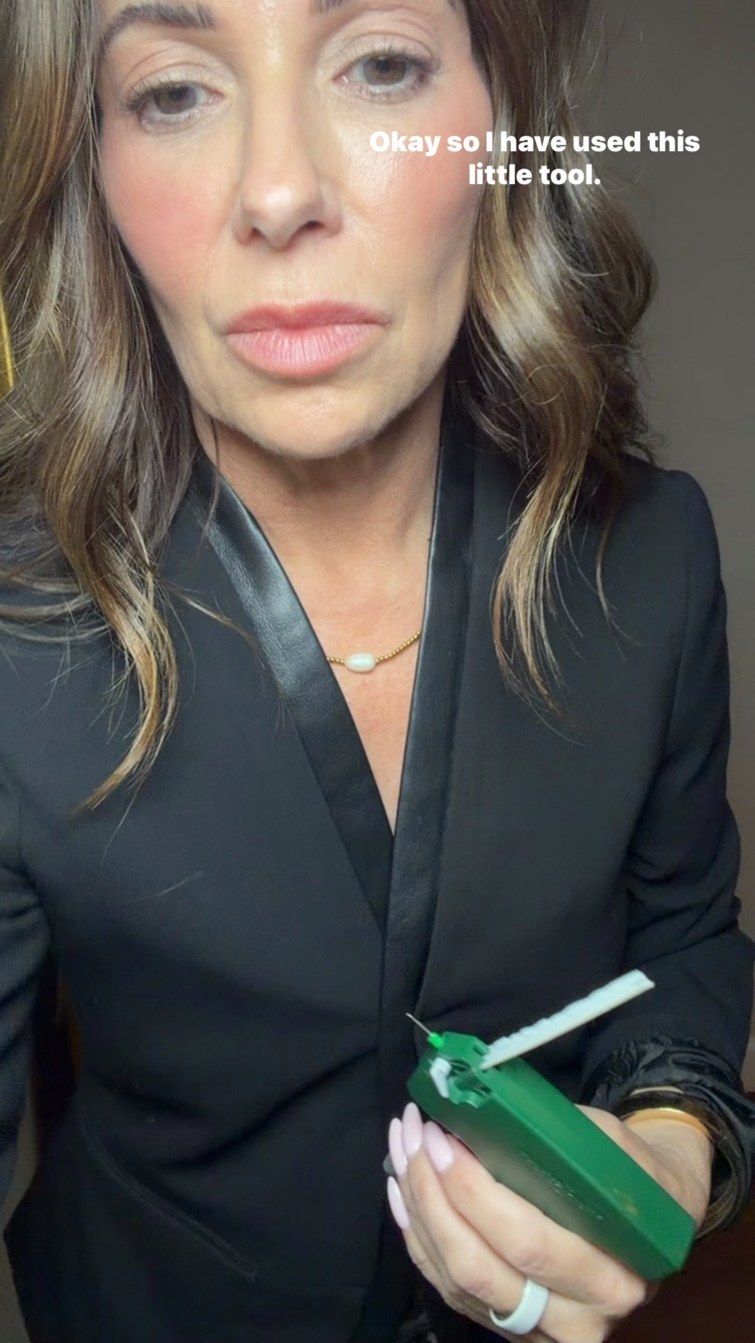 I use this little tool often. My most impressive work is not done on camera while juggling a phone. 
I use it to tack collars down, close button gaps and hemlines.

#LTKdayinmylife #LTKootd