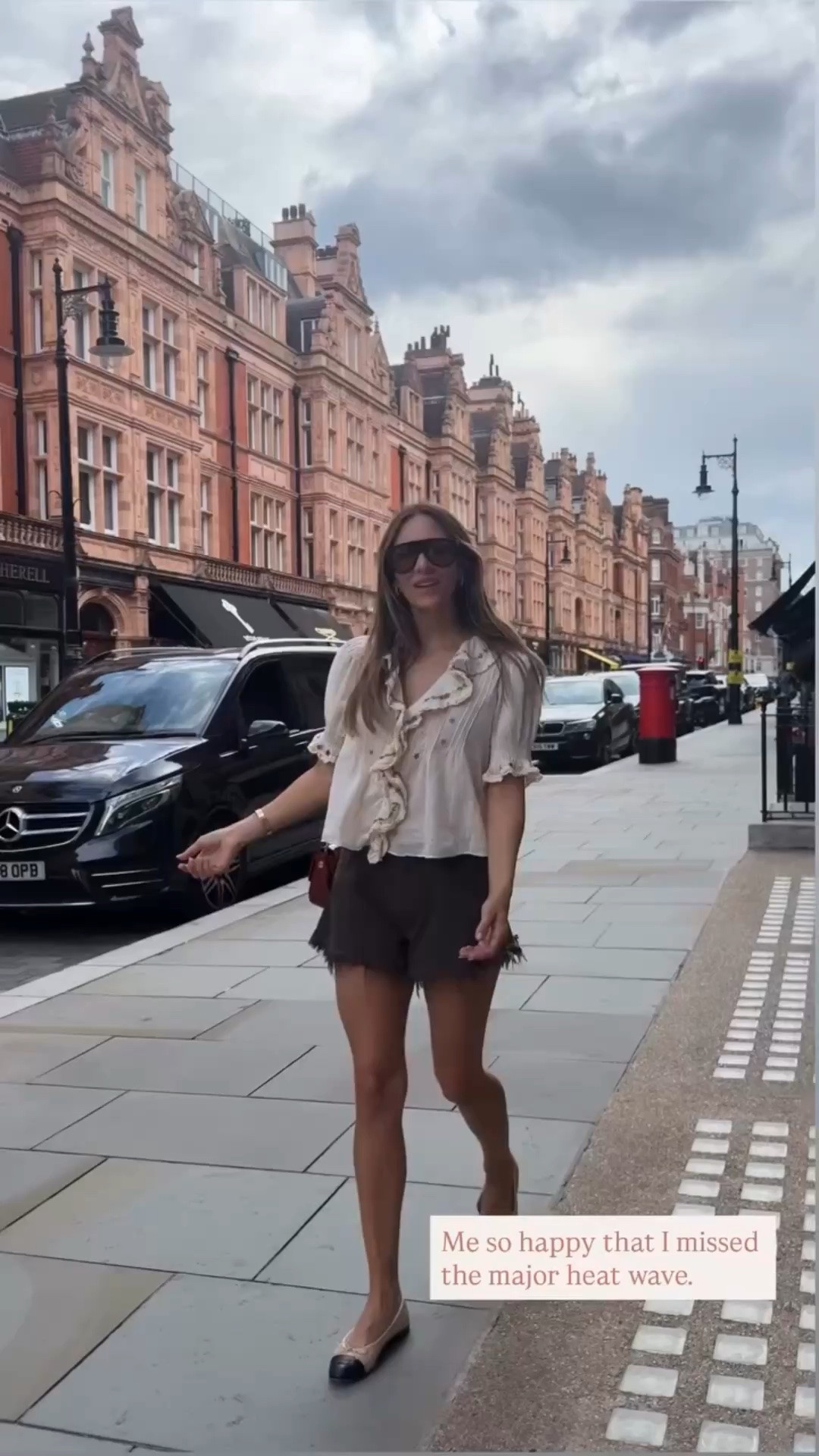 Katharine McPhee Foster ruffle front short sleeve embroidered blouse, $29 frayed denim cut off shorts ￼