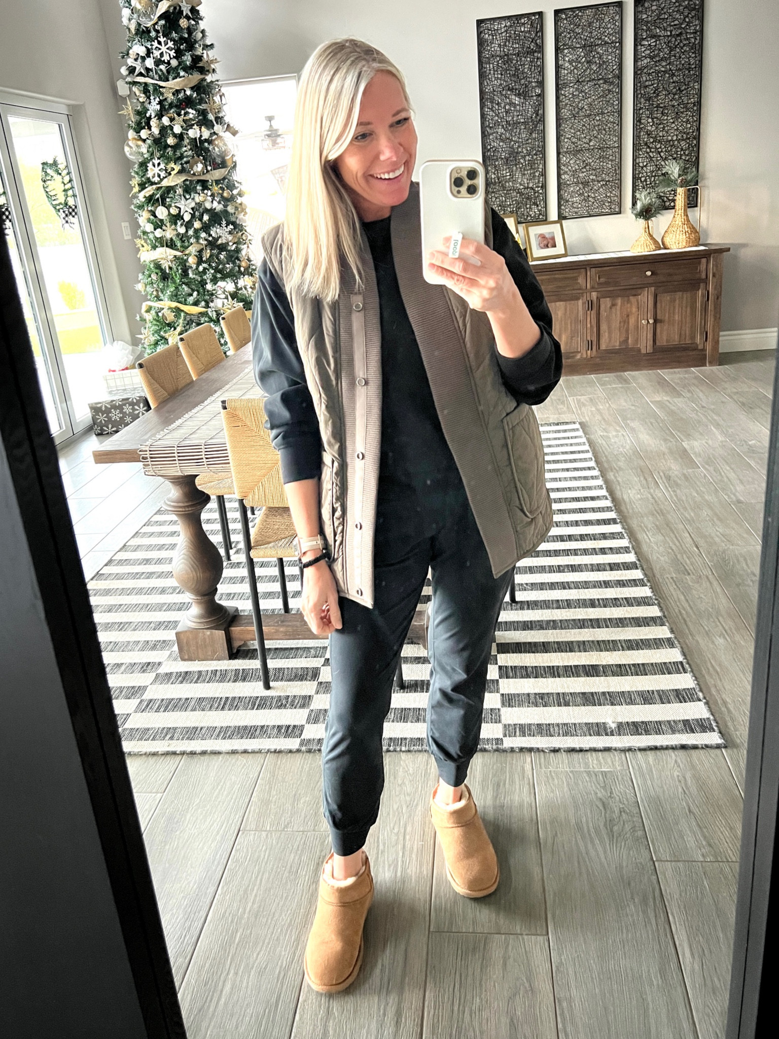 Love these black sweaty Betty joggers with a black sweatshirt quilted Varley Sherpa vest and UGG ultra minis. Size extra small joggers and extra small vest. Vest runs big. Size small sweatshirt. Casual jogger outfit idea.

#LTKHoliday #LTKstyletip #LTKSeasonal