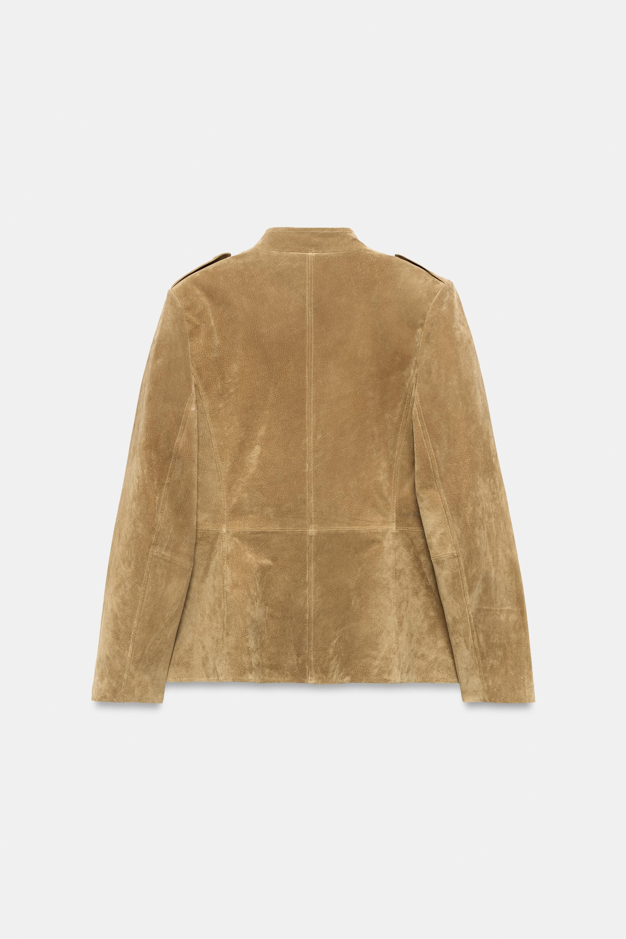Model height: 175 cmJacket made of 100% leather. Featuring a high neck, long sleeves with shoulde... | Zara UK