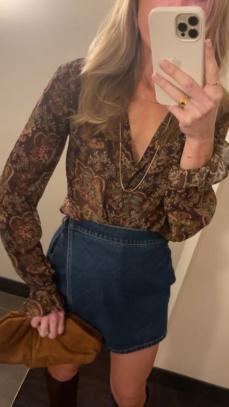 What I wore to a western-themed welcome party at LTKCon 👢This blouse also comes in a dress (linked) and the colorway is gorgeous! Size S blouse, size 2 skirt (size up if between sizes). Boots and bag are sold, similar linked.

#falloutfit #fallgoingoutoutfit #denimskirt #denimskort #fallblouse #brownblouse #floralblouse #falloutfits2023 

#LTKCon #LTKVideo