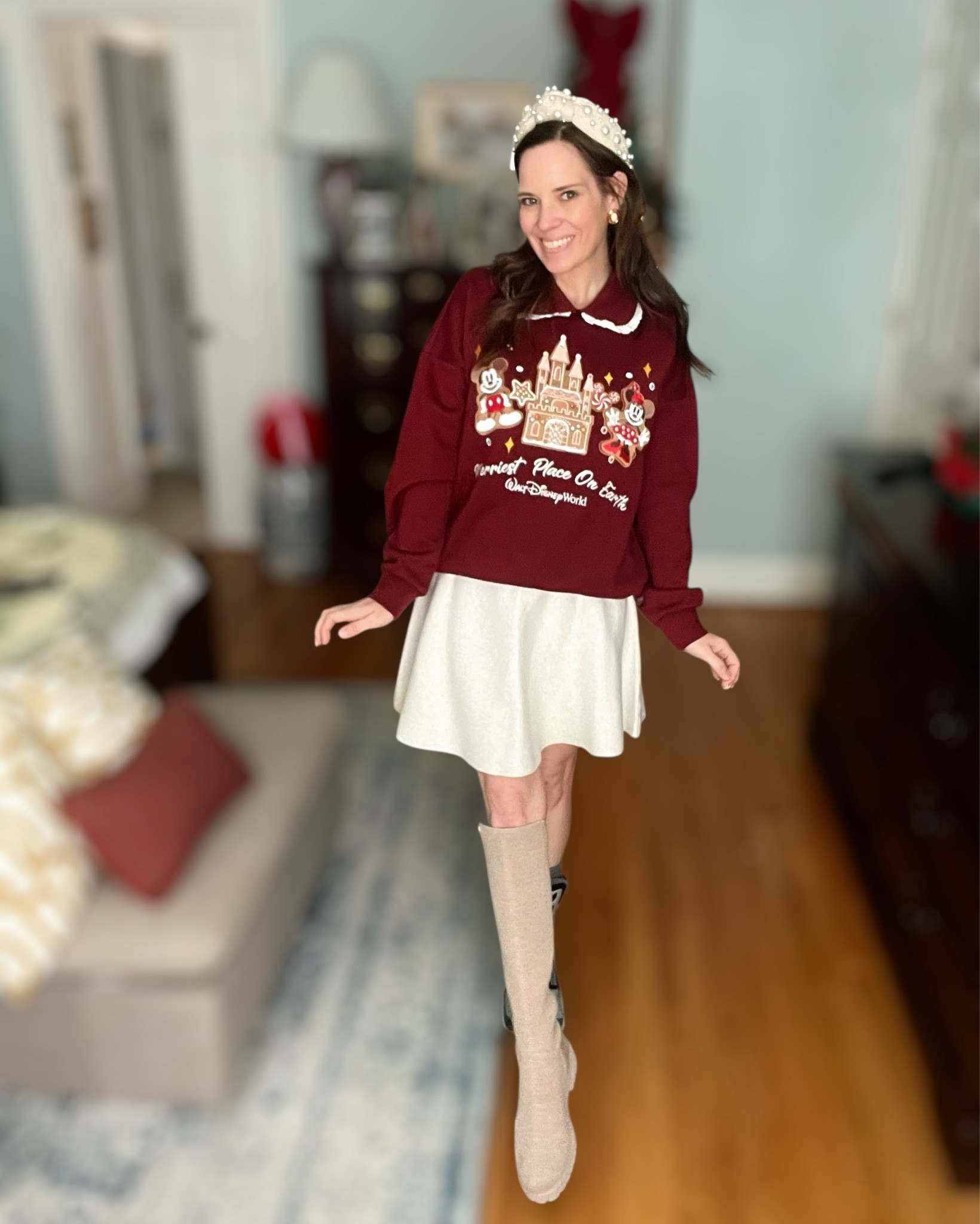 ✨Disney Gingerbread Castle Outfit – Holiday Park Style🍪🏰🎄

This classic Disney Christmas look is as sweet as gingerbread! 🍪❤️ I’m wearing the Mickey & Minnie Gingerbread Castle sweatshirt from the Disney Store paired with the cutest cream sweater skirt (Target find!) for a comfy-cute holiday outfit you can wear to the parks or at home wrapping gifts. I styled it with my favorite pearl headband, cozy knee-high woven boots, my gold oval earrings, and a two-tone pearl watch to finish the festive look. 🎁✨ This combo is soft, sparkly, comfortable, and absolutely holiday-photo ready!

Such a fun outfit idea for:
🎄 Mickey’s Very Merry Christmas Party
🍭 Holiday park days
🎁 Christmas card photos
☕ Cozy winter days
✨ Festive brunch or cookie decorating

⸻

M

Disney holiday outfit, Christmas Disney sweatshirt, Mickey and Minnie gingerbread sweater, Disney parks Christmas look, festive winter outfit, holiday skirt outfit, cream sweater skirt, cozy knee high boots, winter boots, pearl headband, holiday accessories, Christmas style inspiration, Disney World holiday, Merryest Place on Earth sweatshirt, comfy cute holiday outfit, winter fashion finds, holiday photo outfit idea, gingerbread castle sweatshirt, neutral winter boots, holiday outfit for moms, cute Disney Christmas outfit ideas 🎄🍪✨

#LTKFindsUnder50 #LTKTravel #LTKHoliday