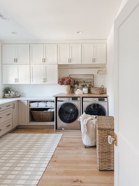 Light and bright laundry room with aesthetic and functional organization! Baskets for storage and linen blend seamlessly with the space 

Spring refresh, home finds, organization details, laundry room refresh, light and bright, faux florals, basket finds, neutral area rug, neutral wood tones, gold detail, glass dispenser, velvet hanger, Pottery Barn style, Target, found it on Amazon, neutral decor, aesthetic home, shop the look!

#LTKstyletip #LTKSeasonal #LTKhome