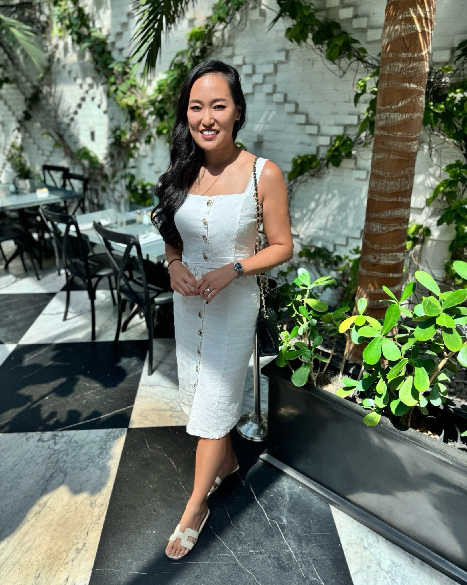 Effortless chic in this white button-front midi dress 🤍 The perfect spring & summer outfit for brunch, date night, vacation, or a classy everyday look. I paired it with neutral slide sandals and a mini black chain bag for a timeless, classy vibe. Lightweight, flattering, and bump-friendly, this is one of those versatile wardrobe staples you’ll wear on repeat.

Perfect for:
• Spring brunch outfits
• Summer vacation style
• Resort wear looks
• Neutral capsule wardrobe
• Classy feminine outfits

———

white midi dress, white button front dress, spring brunch outfit, summer date night outfit, neutral summer outfit, feminine classy outfit, resort wear women, vacation dress outfit, beige slide sandals, minimalist summer style, capsule wardrobe dress, wedding guest daytime dress, garden party outfit, timeless women’s fashion, elevated casual look, chic summer outfit, classy mom style, neutral aesthetic outfit, Florida spring outfit, brunch outfit ideas

#LTKdayinmylife #LTKvlog #LTKootd