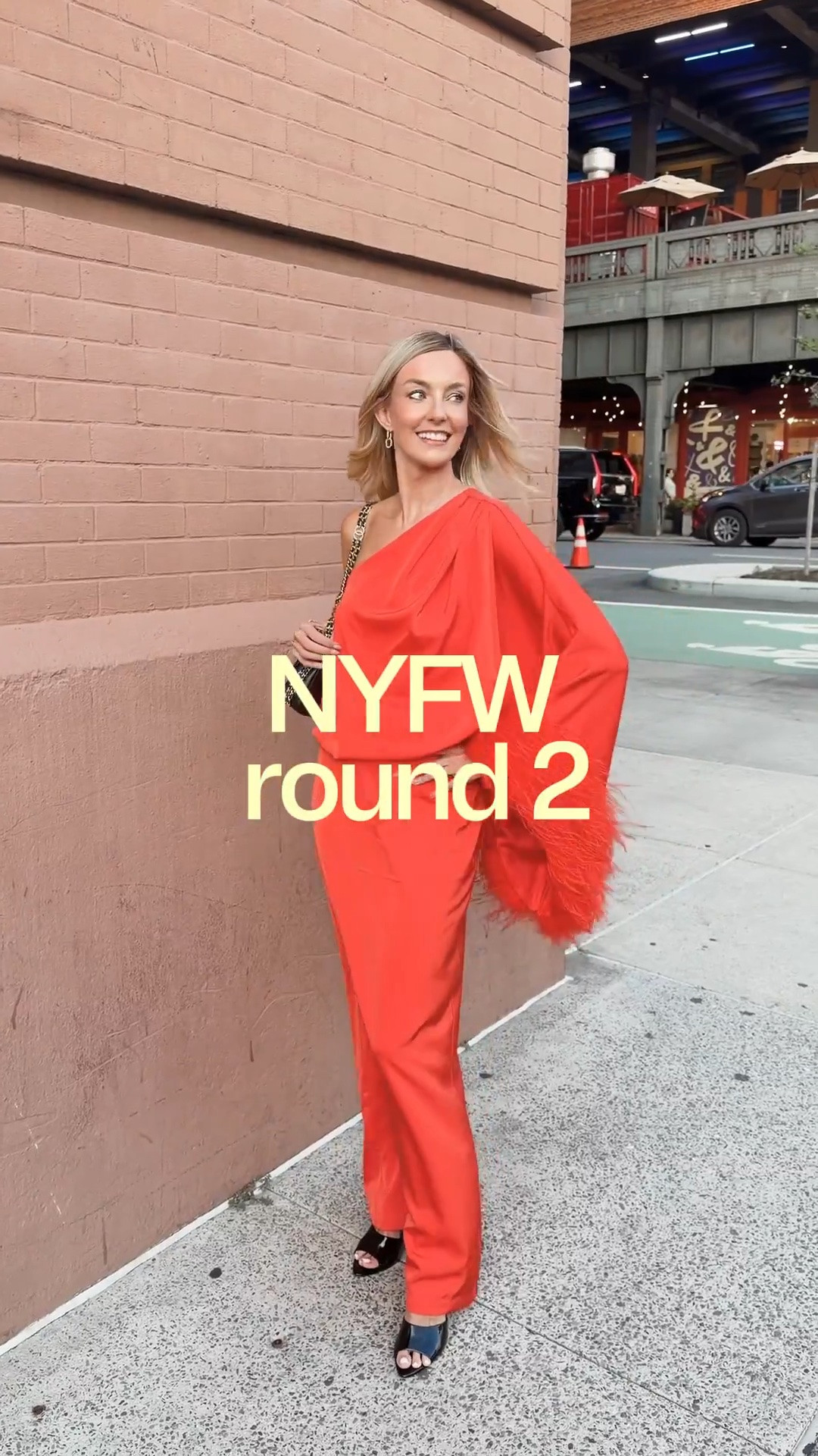 Wore this beauty to NYFW! Orange asymmetric dress @Club L London wearing size 4! Would be perfect wedding guest dress too!

#LTKNYFW #LTKootd #LTKWedding