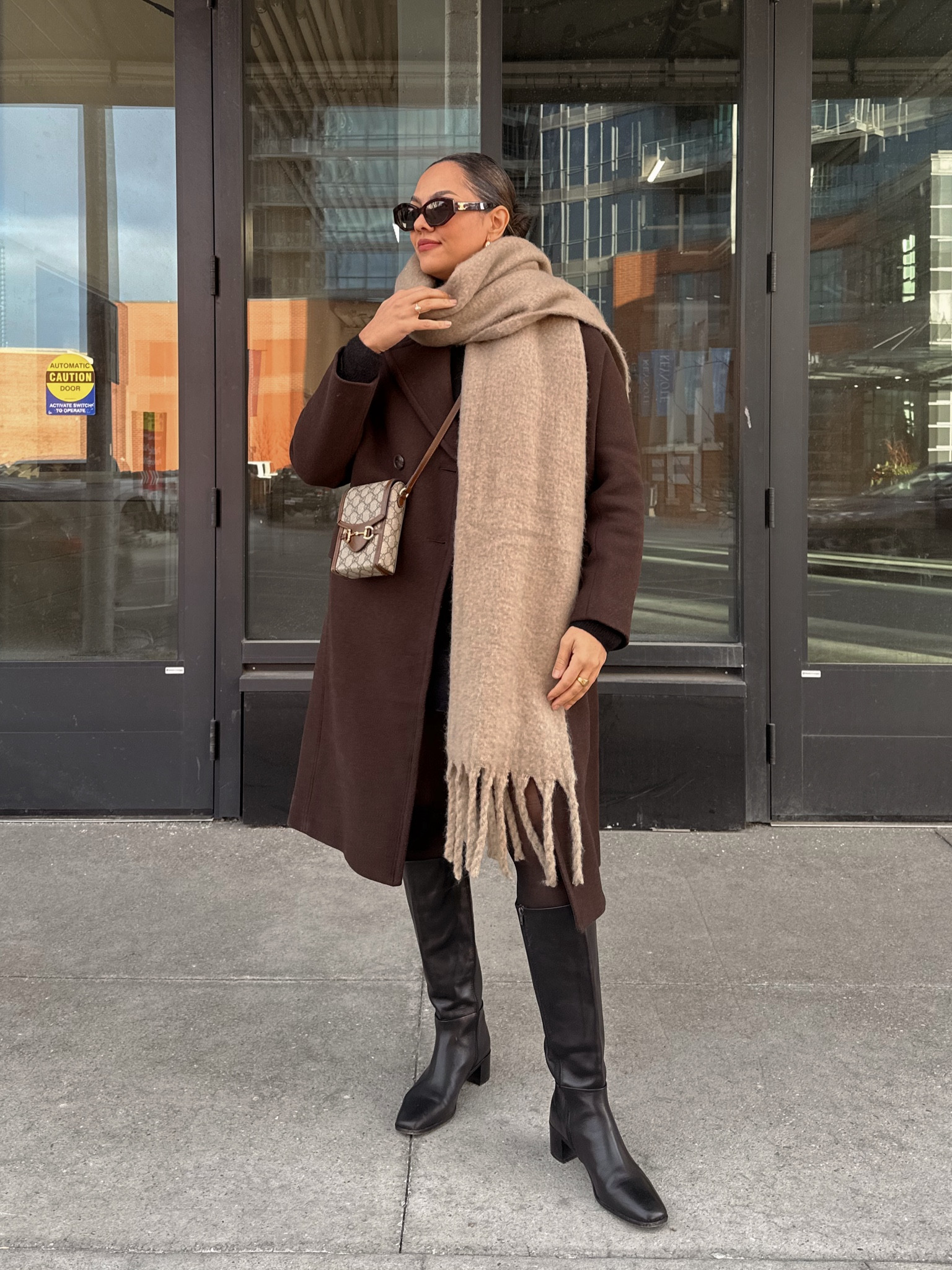 Winter outfit inspiration! Details below:
-Madewell brown wool coat, I have a size 8 
-Madewell black leather knee high boots, similar linked 
-Gucci horsebit mini crossbody bag 
-Zara scarf, similar linked 
-Celine sunglasses 
-Abercrombie black Mockneck short sleeved dress, I have a medium 
-Black tights from H&M, I have a large 


#LTKfindsunder100 #LTKstyletip #LTKSeasonal