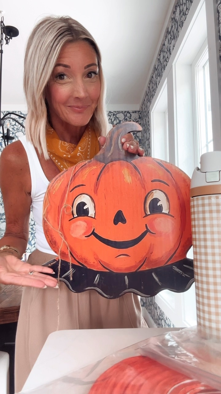 This pumpkin has all the nostalgic pills. I am obsessed with it.!!!! I’m going to add a black-and-white striped ribbon and put it on my front door. Stick around to see more.!!! 🎃🎃🎃

#LTKSeasonal #LTKHome #LTKdayinmylife