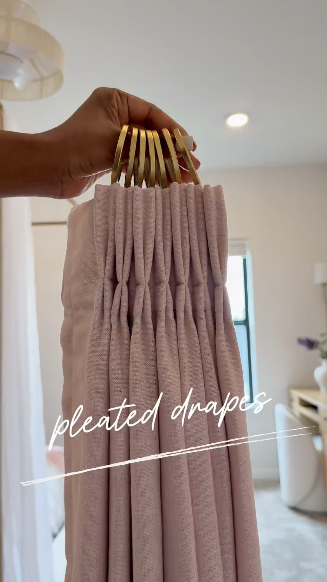 I'm absolutely in love with how these drapes turned out 👌🏾…..I've also got the same drapes in our guest room and great room.

Like many of you, I received a hefty quote for drapes a few years ago - 10K to be exact…..and that was just for three windows. 😅 I mean, who doesn't love the look of custom drapes? I particularly love the pinch pleat - it's my favorite. 😍 

One thing to keep in mind with this system is that you'll need to account for roughly 6 inches of slack. 🤎 So if your ceiling height is 108 inches, you'll need to order 102-inch drapes if you want to hang the rod at the very top and have the drapes ""kiss"" the floor. Thanks to hubby for helping me figure out precision & measurements. Shop now and  transform your home.

#LTKStyleTip 
#LTKSaleAlert #LTKHome