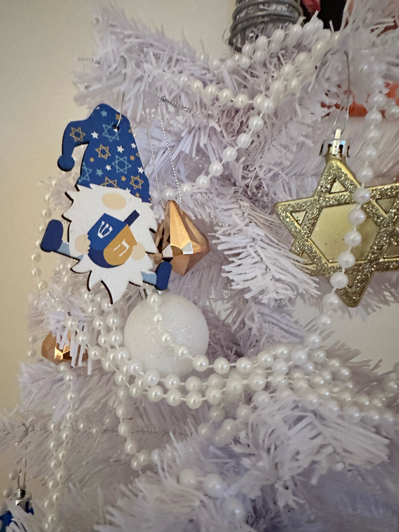 Feeling the joyful spirit of the season with a stunning Christmas tree adorned with a beautiful array of festive ornaments! 🎄✨✨✨ Immersed in the holiday cheer, we also incorporated Hanukkah ornaments and gnomes to celebrate the diversity and unity that this time of year brings. 🕎💙 May this photo inspire smiles, warmth, and a reminder of the magic that comes with the holidays! #ChristmasMagic #FestiveVibes #HolidayCheer #DiversityCelebration #SeasonOfJoy #ChristmasTreeDecorations #HanukkahOrnaments

#LTKSeasonal #LTKhome #LTKHoliday