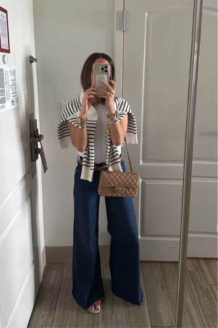 Loving this outfit! Great for just an everyday outfit or even wear this to work! Mango striped sweater (sized up to medium) cuts tee (sized up to a small) frame jeans (tts, xs)

#LTKfindsunder100 #LTKworkwear #LTKstyletip