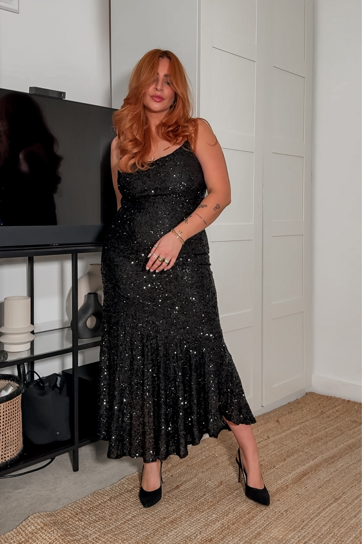 Black sequin never fully dressed dress 

I’m wearing a size 12 but a 14 would have been perfect to :) 

#LTKmidsize