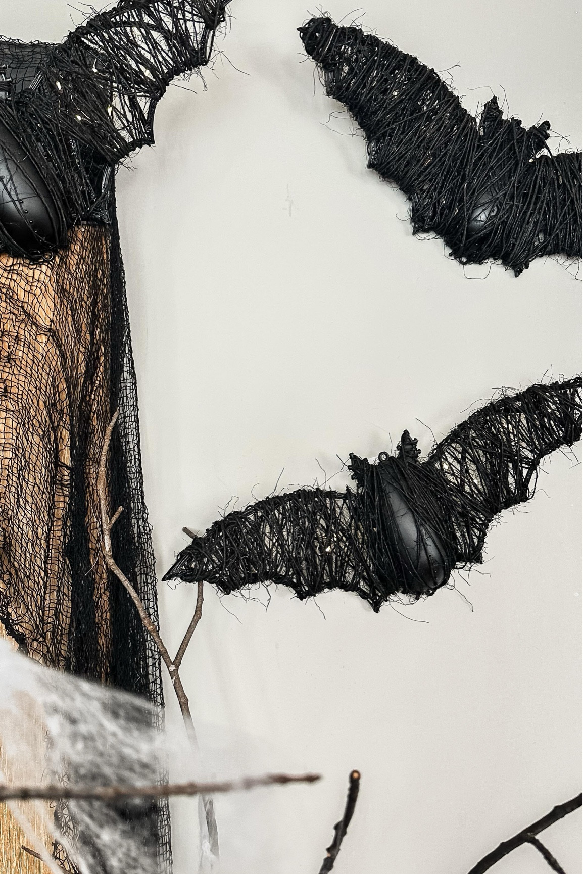 Pottery Barn Lit Woven Bat Dupe 🦇 $79 for 2 compared to $3 for 3. I’ll take my DIY version any day! 

Grab some of these Dollar Tree bats, some twine from your garage, black spray paint and a pack of twinkle lights from your decorations. 

So quick and easy, mistake-free, and an instant upgrade to my Halloween decorations!

Follow @growingupkemper for more attainable DIYs, tips, tricks and inspiration!

#halloweendecor #diyhalloweendecorations #potterybarndupe