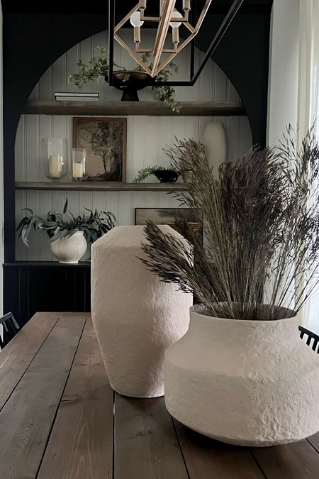 Oversized vases: paper mache! Lightweight and beautiful texture. These will make an organic statement anywhere. Love them together here on my dining table! 
Modern organic home decor 

#LTKhome #LTKfindsunder100