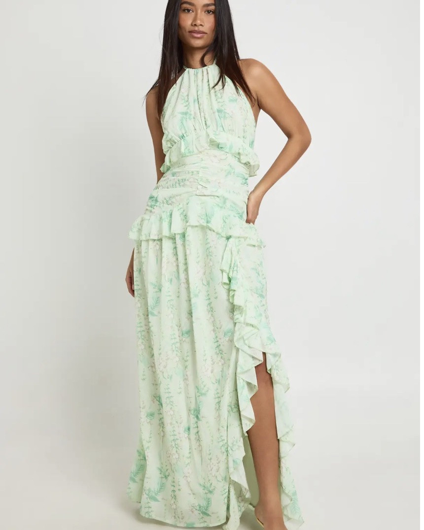 Elegant floral halterneck design
Luxurious flowing chiffon fabric
Romantic ruffle detailing
Flattering maxi length silhouette
Description
Elegant halterneck design with gathered neckline for a sophisticated silhouette
Flowing chiffon fabric creates graceful movement with every step
Cascading ruffle detail adds dimension and visual interest
Dramatic maxi length with asymmetric hem and side split for effortless mobility
Flattering cinched waist enhances your natural shape
Make an unforgettable entrance in this show-stopping floral maxi dress. The halterneck design frames your shoulders beautifully while the lightweight chiffon fabric creates an ethereal quality that's perfect for special evenings out. The cascading ruffles add a touch of drama and movement as you navigate the dance floor, while the side split offers both practicality and allure. Style with strappy heels as shown for evening drinks or summer parties. For cooler evenings, layer with a cropped jacket and statement earrings. This versatile piece transitions seamlessly from cocktail bars to upscale restaurants-simply switch your accessories to match the venue. The maxi length creates an elongated silhouette that works brilliantly for both formal gatherings and more relaxed social occasions when you want to make an impression.
&@boohoo

#LTKSaleAlert #LTKdayinmylife #LTKU