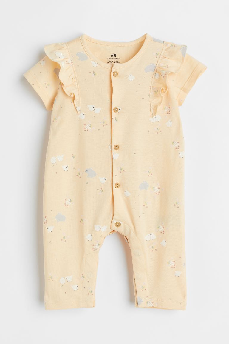 Short-sleeved romper suit in soft jersey with a printed pattern. Buttons at front and concealed s... | H&M (US + CA)