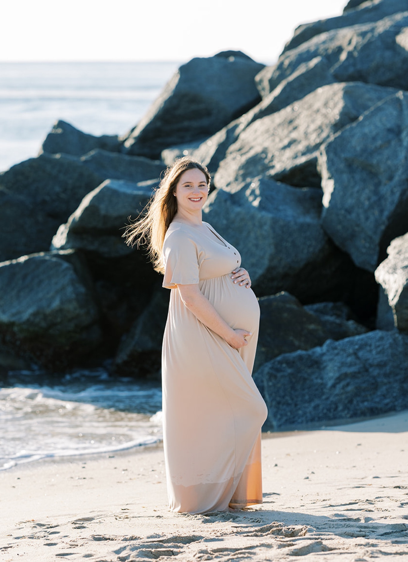 Beach maternity photo shoot with a beige dress from Amazon  

#LTKfamily #LTKfindsunder50 #LTKbump