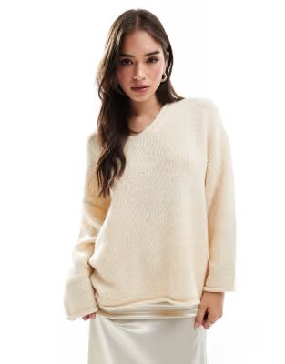 ASOS DESIGN loose knit v neck longline jumper in cream | ASOS | ASOS (Global)