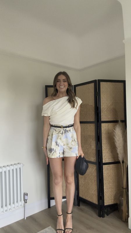 Summer evening outfit idea
Size 10 in the River Island drape cream top
Size 8 in the tailored printed shorts 
I’m 5ft 6 

Celine small triomphe black belt
Black barely there heels
Songmont Luna black bag 
M&S gold bottega dupe earrings 



#LTKSeasonal