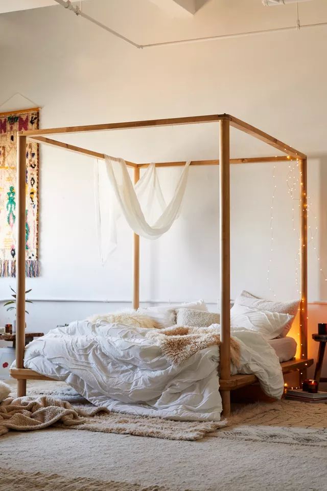 Eva Wooden Canopy Bed | Urban Outfitters (US and RoW)