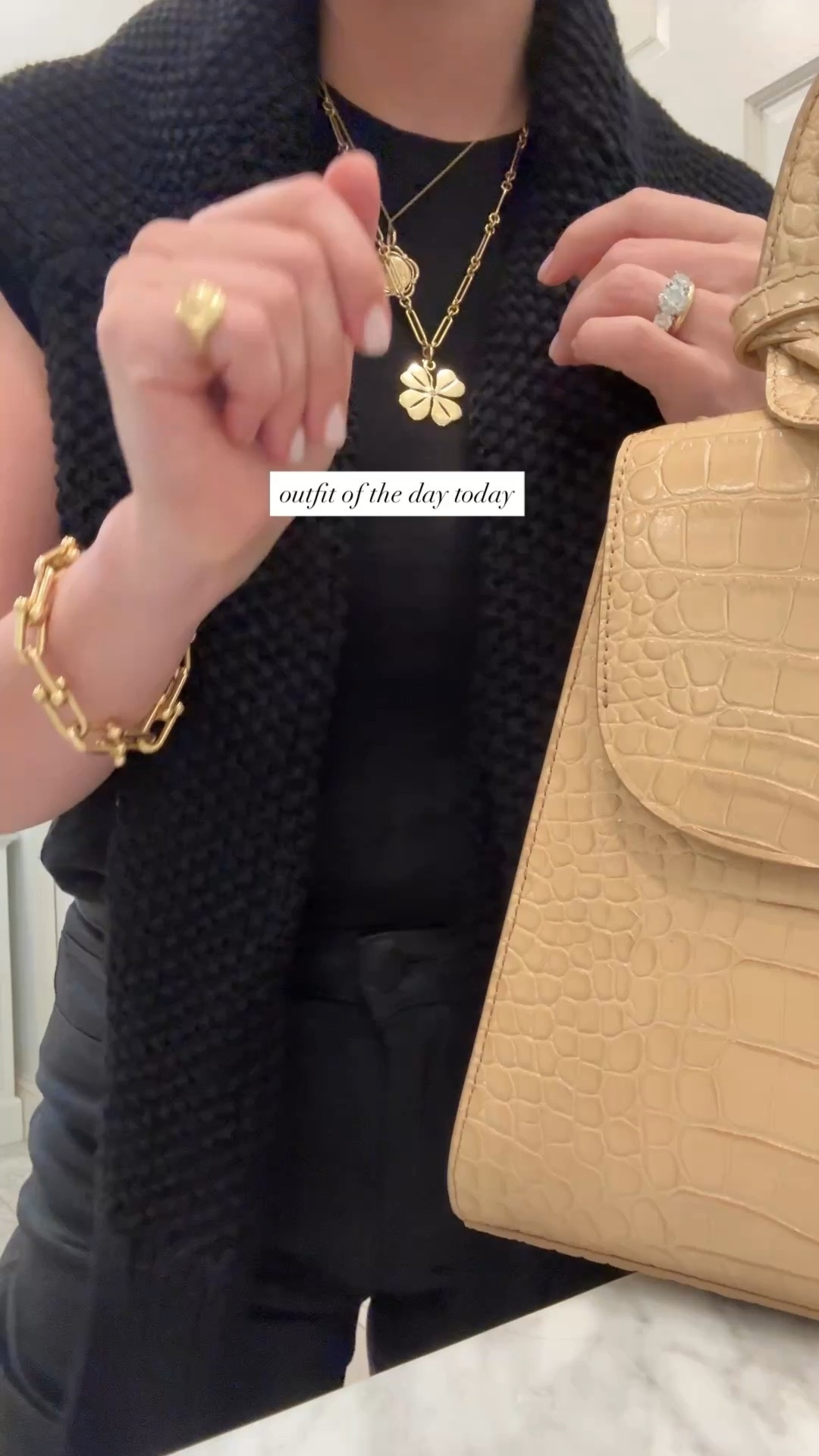 Necklaces and pinky ring are by Aurelia Demark. 