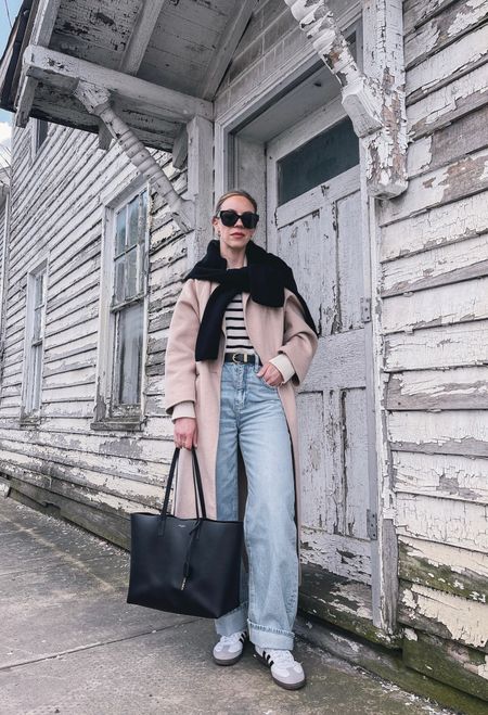 Spring outfit with beige coat, striped sweater, barrel jeans, Adidas Samba sneakers, YSL tote bagg

#LTKfindsunder100 #LTKshoecrush #LTKitbag