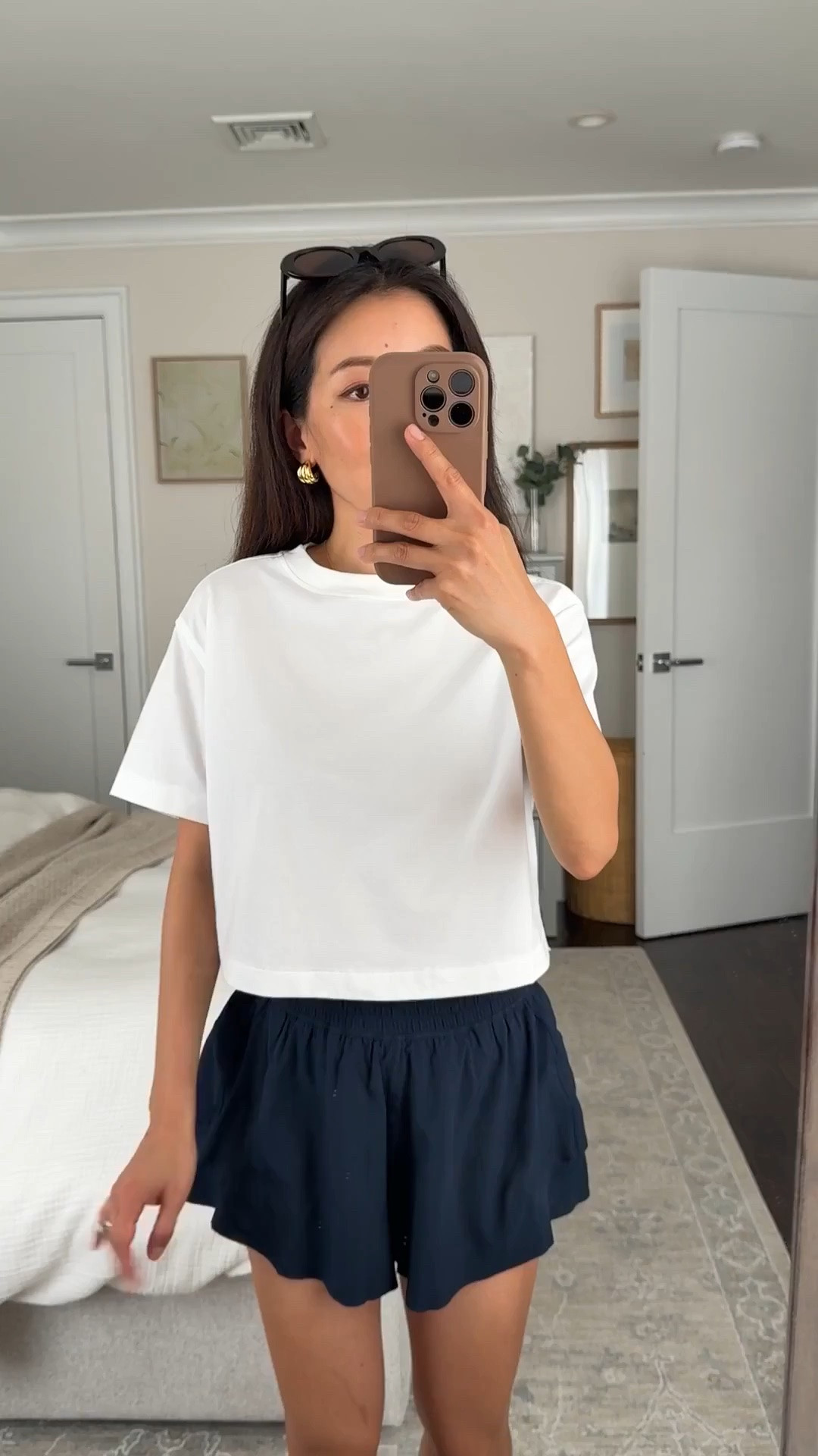 Sizing info below! 
• All Yours Organic Cotton Cropped T-Shirt xxs. Soft but has some boxy structure and the length is great for still showing the waistline but doesn’t show my skin. 
• High-rise flutter shorts size XS. I sized up. XS waist measures 24” when not stretched. 
• Madewell sunglasses 

Athleisure, walks, easy mom style, running errands

#LTKPetite #LTKActive #LTKmomlife