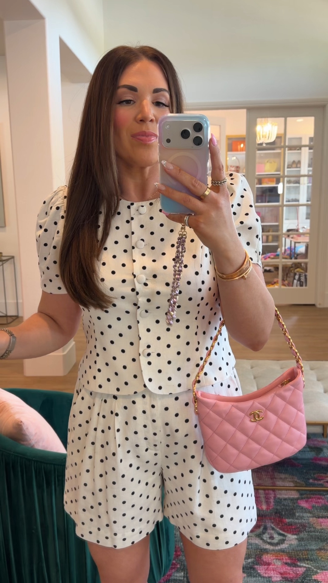 curvy midsize white and black polka dot set for spring! wearing size large in top and large in pleated shorts 

#LTKMidsize #LTKSeasonal