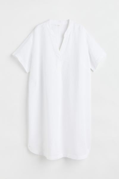 Tunic in woven viscose fabric. Low stand-up collar, V-shaped opening at front, dropped shoulders,... | H&M (US + CA)
