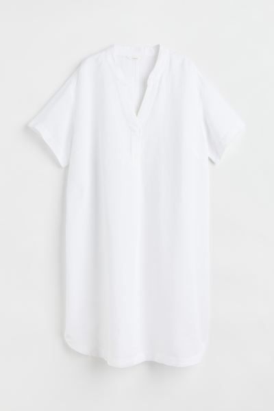 Tunic in woven viscose fabric. Low stand-up collar, V-shaped opening at front, dropped shoulders,... | H&M (US + CA)