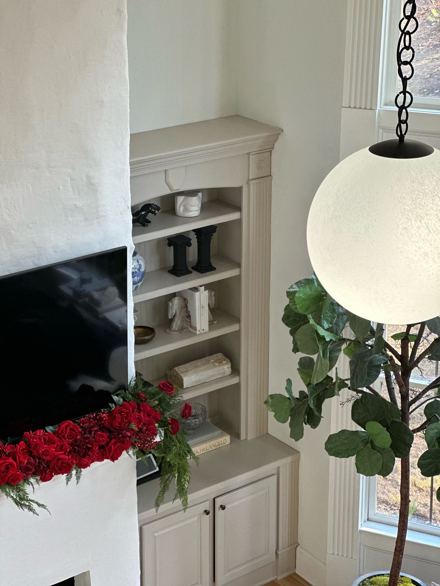 Idk about you, but I always have to start with the mantel when decorating for Christmas. This year, I was inspired by a bouquet of red flowers. My fav flowers are roses and peonies, so that’s what I used. #rose #roses #garland #cb2 #moon #pendant #mcm

#LTKHome #LTKSeasonal #LTKHoliday