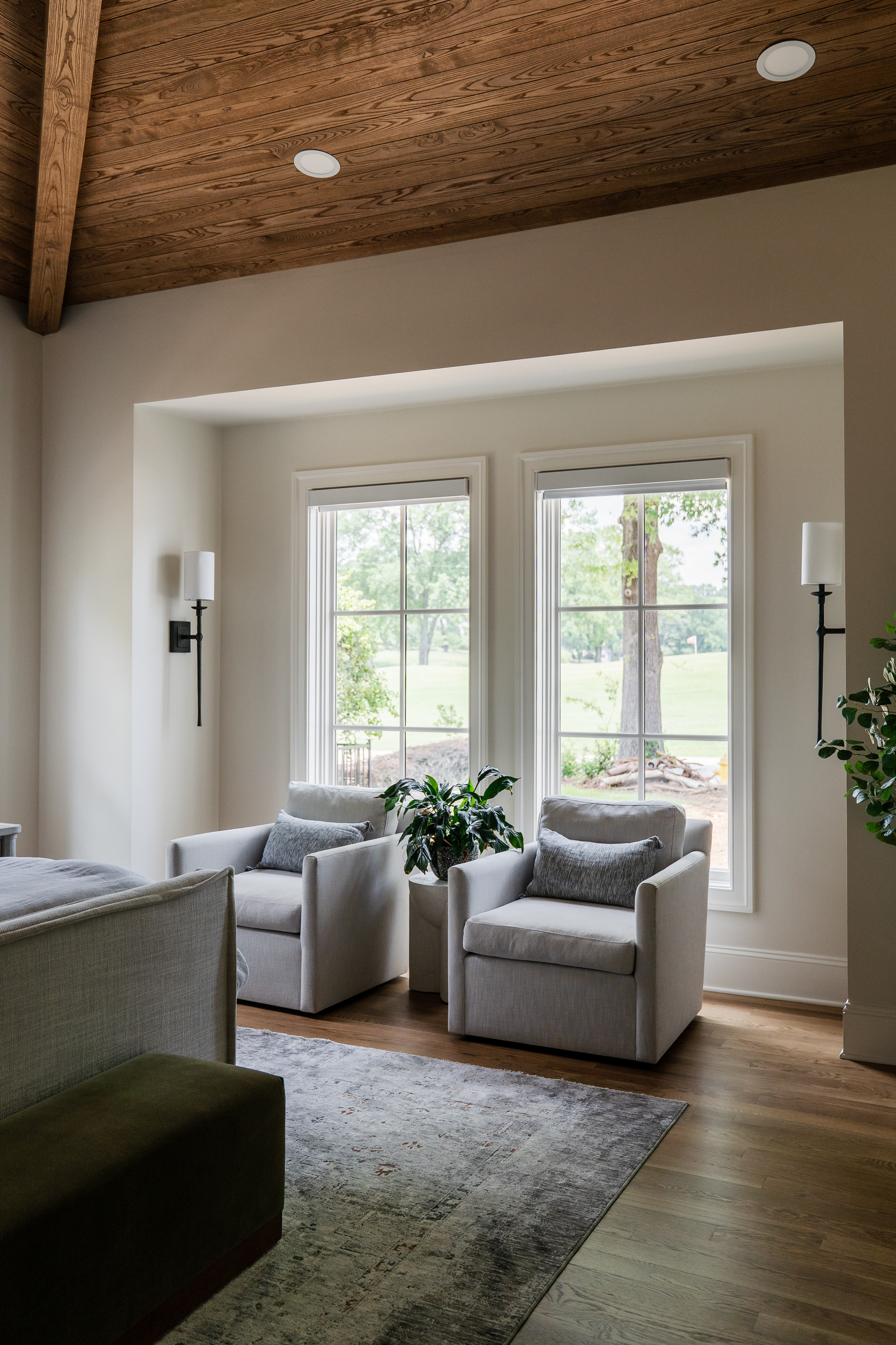 A bedroom designed to feel quietly special 🤍 This primary suite blends timeless character with soft, layered comfort — from the plaster fireplace that anchors the space to the vaulted wood plank ceiling that adds warmth and architectural interest. A cozy seating nook by the window creates the perfect spot to unwind, making the entire room feel calm, elevated, and effortlessly livable. Shop a similar bedroom look below ✨

#ltkhome #primarybedroom #bedroomdesign #timelessinteriors #cozyhome #layeredliving #customhome #interiorinspo #neutralhome #homedecor 

 #LTKHome
