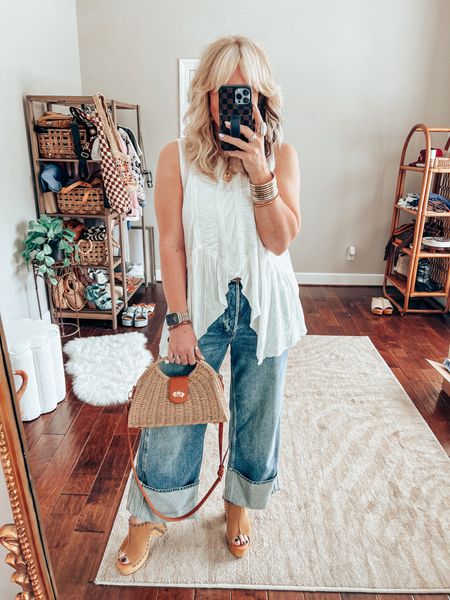 •Top is @threebirdnest on IG save with code MANDIE. (I cannot link this top here)
•Jeans I size down one size in them. 
•Sandal run true to size. 
•TWISTED SILVER necklace & bracelet save with code MANDIE15

#LTKstyletip #LTKover40 #LTKitbag