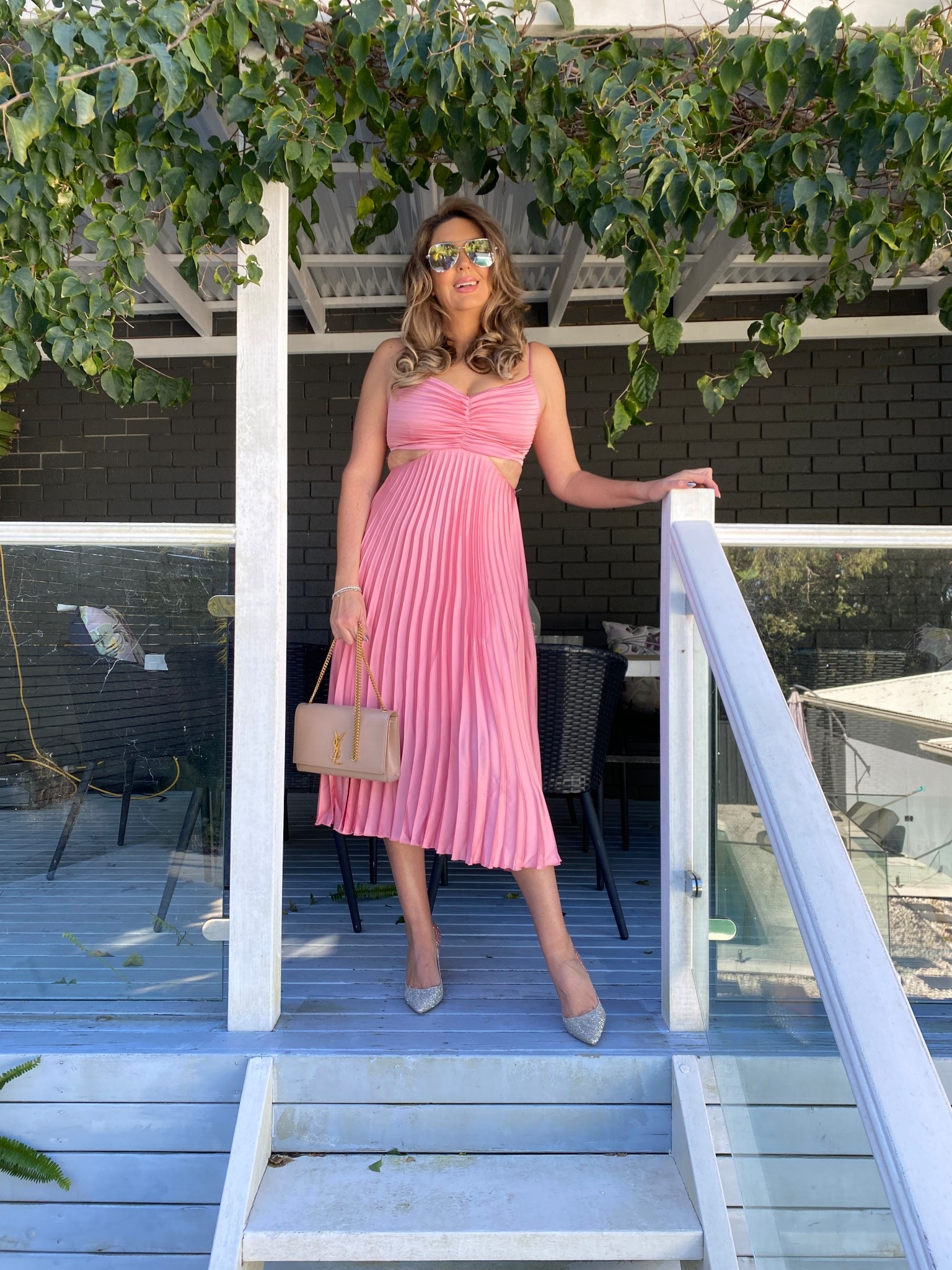 Pink pleated cut out midi dress from Petal & Pup 

#LTKaustralia #LTKsale #LTKmidsize