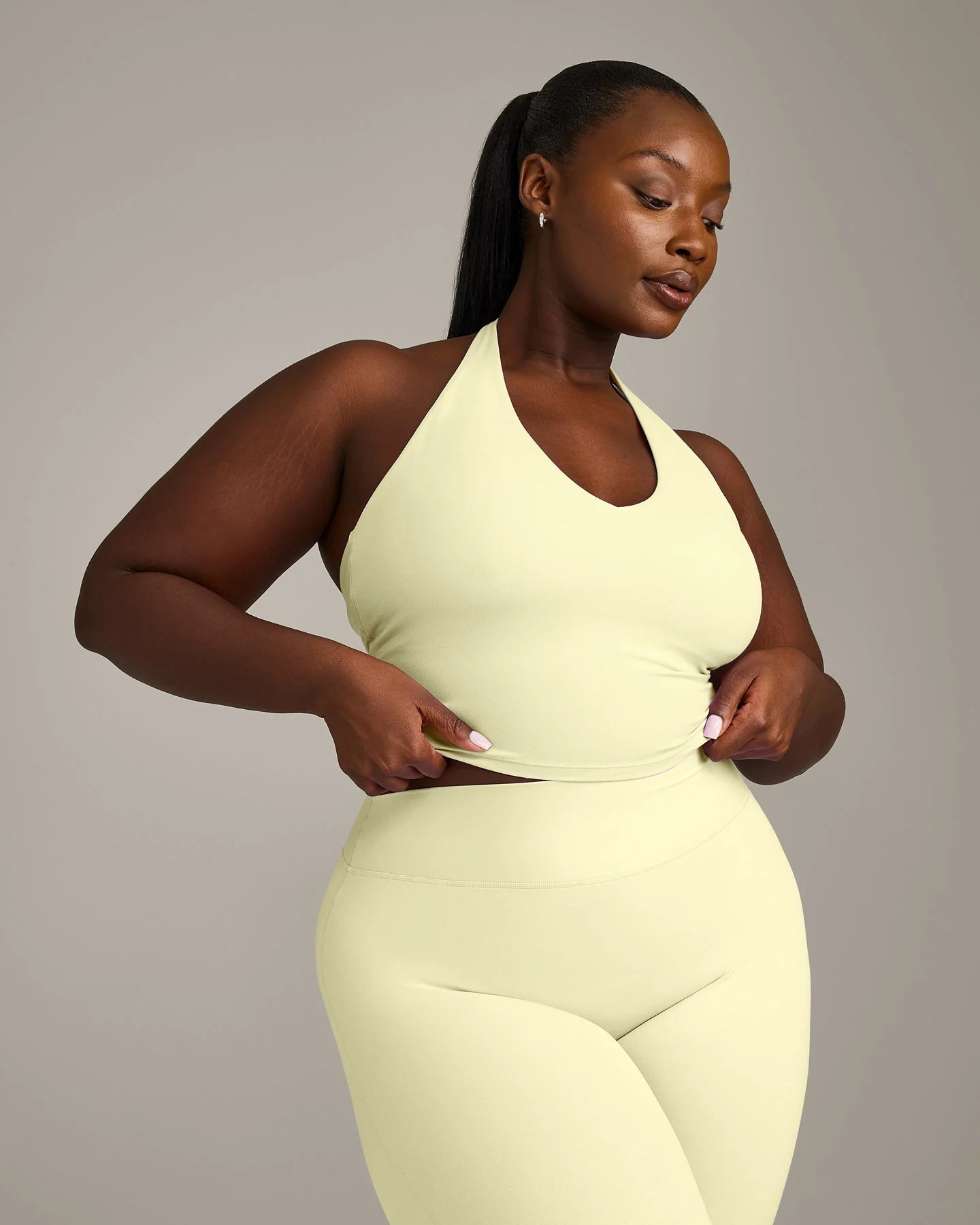 SoftMotion™ Halter Neck Mid Tank Top with Built in Bra Shelf with Gray Logo 
 Pastel Yellow | Oner Active (UK / US)