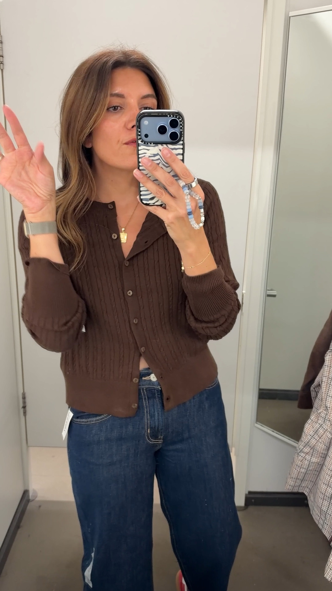 Up to 50% off! Cableknit cardigan in a size small. I’m 5’7”. Jeans in a 4.