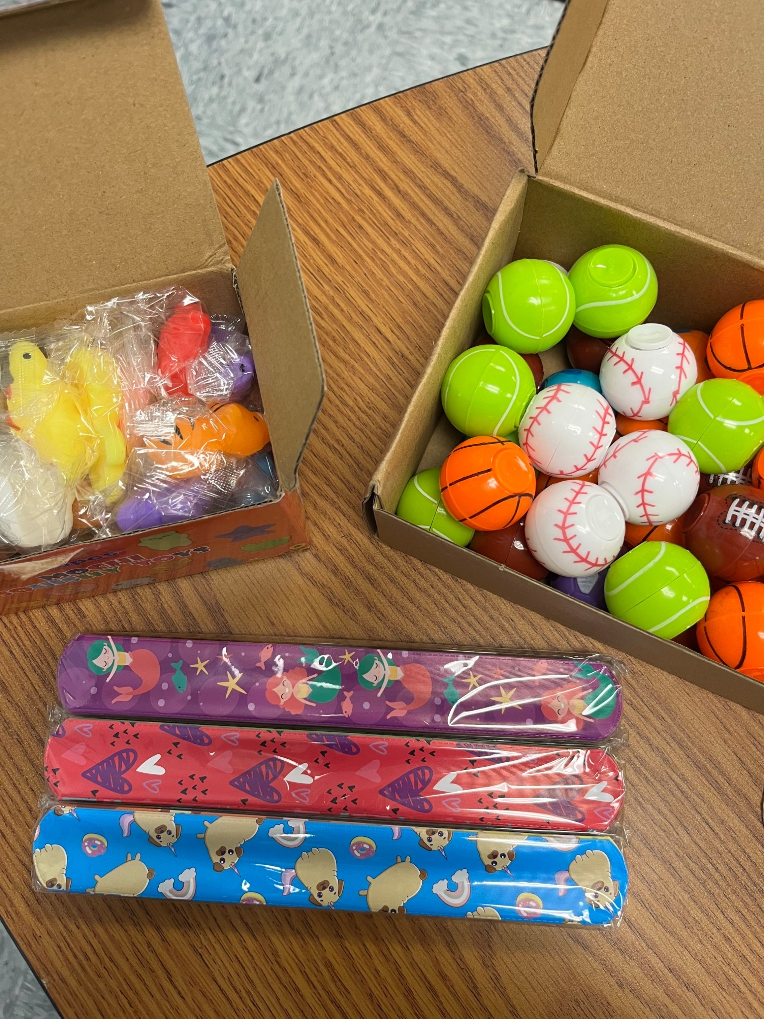 our classroom treasure box was in need of a refill and my dad donated new prizes for my students, they are going to be so excited!! my students LOVE slap bracelets and these little squishy toys. everything is affordable and perfect for a mid year
classroom prize  restock! 

#LTKGiftGuide #LTKHoliday #LTKKids