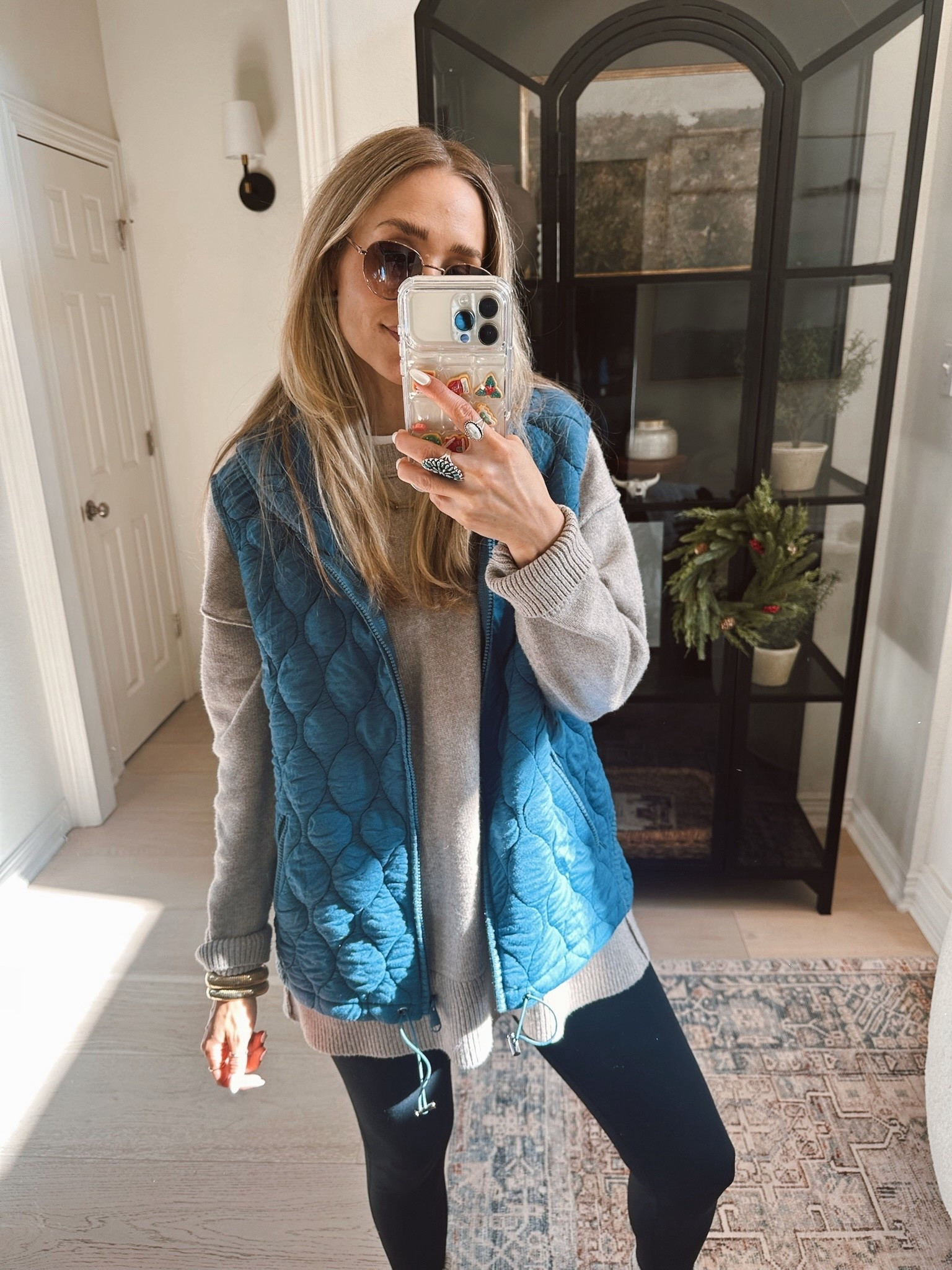 🤍 The perfect outer wear outfit! 
FP look alike vest— size s 
Aerie sweatshirt— oversized, wearing small
Fleece lined leggings — size s 
The coziest socks!!! 
Look for less Birkenstock shoes 

#LTKootd #LTKTravel #LTKWorkwear