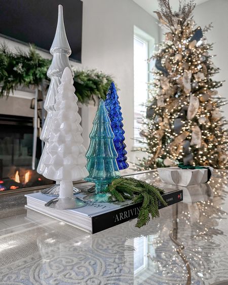 Coastal inspired Christmas coffee table decor! These glass trees are stunning and can be used so many ways!  

#LTKSeasonal #LTKHoliday #LTKhome