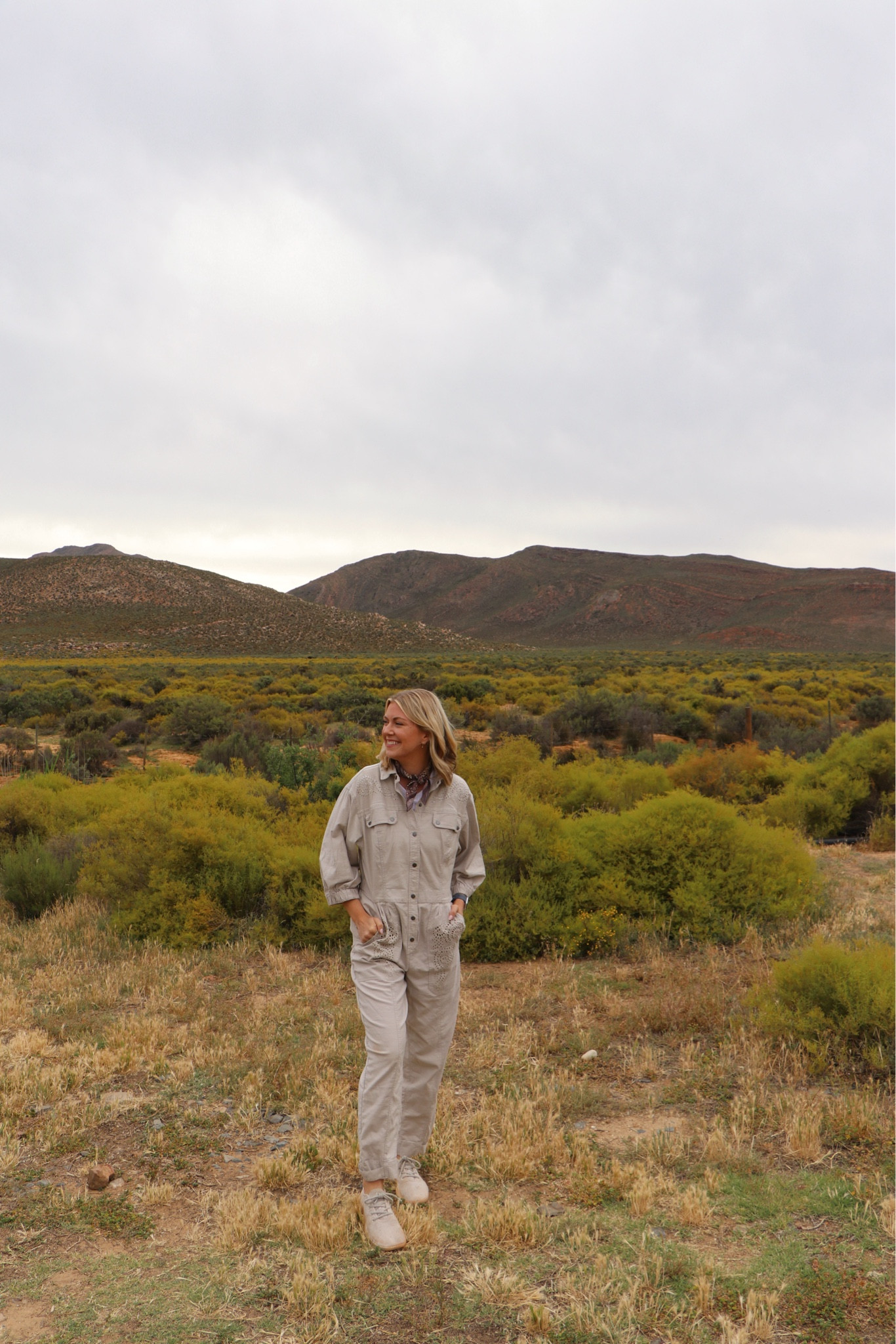Wearing a grey/cream utility jumpsuit on safari in South Africa! Paired with a cute purple patterned bandana.

#LTKstyletip #LTKtravel