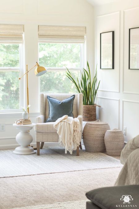 This corner of our bedroom is the perfect place to enjoy a book or to unwind after a long day. home decor bedroom decor reading nook easy chair woven storage baskets wall art floor lamp cozy throw

#LTKhome #LTKstyletip