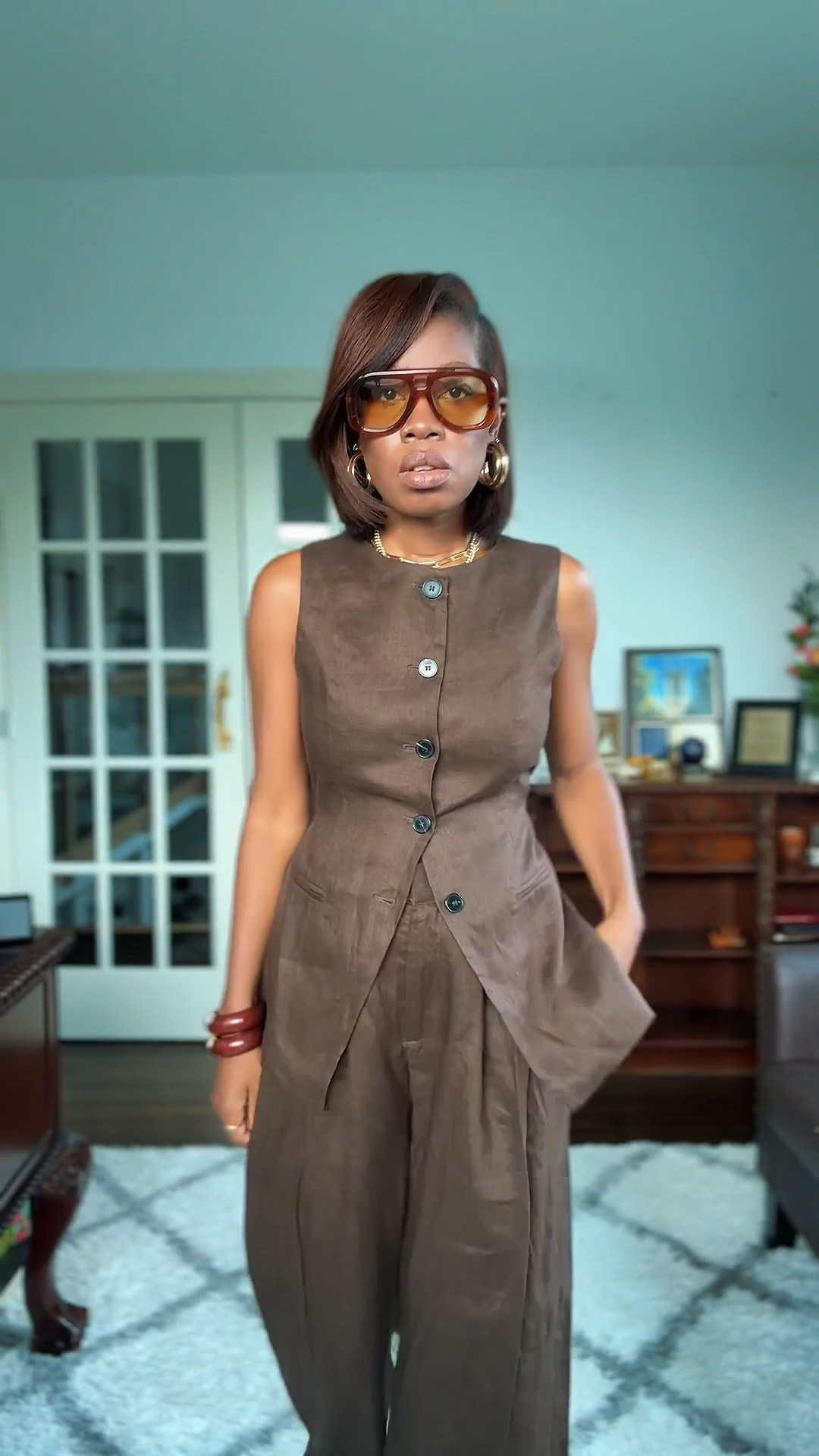 A linen set hates to see me coming. Love this brown linen vest and pants from Dissh. Use my code ENOCHA FOR 10% off my necklaces. #vacationoutfit

#LTKStyleTip