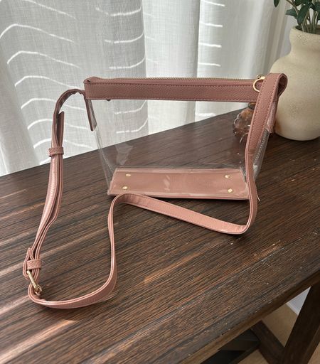 Clear bag for events that’s actually cute! From Amazon. Love the pink color and adjustable strap. Perfect size to fit water bottle, wallet & phone  

#LTKparties #LTKfindsunder50 #LTKstyletip