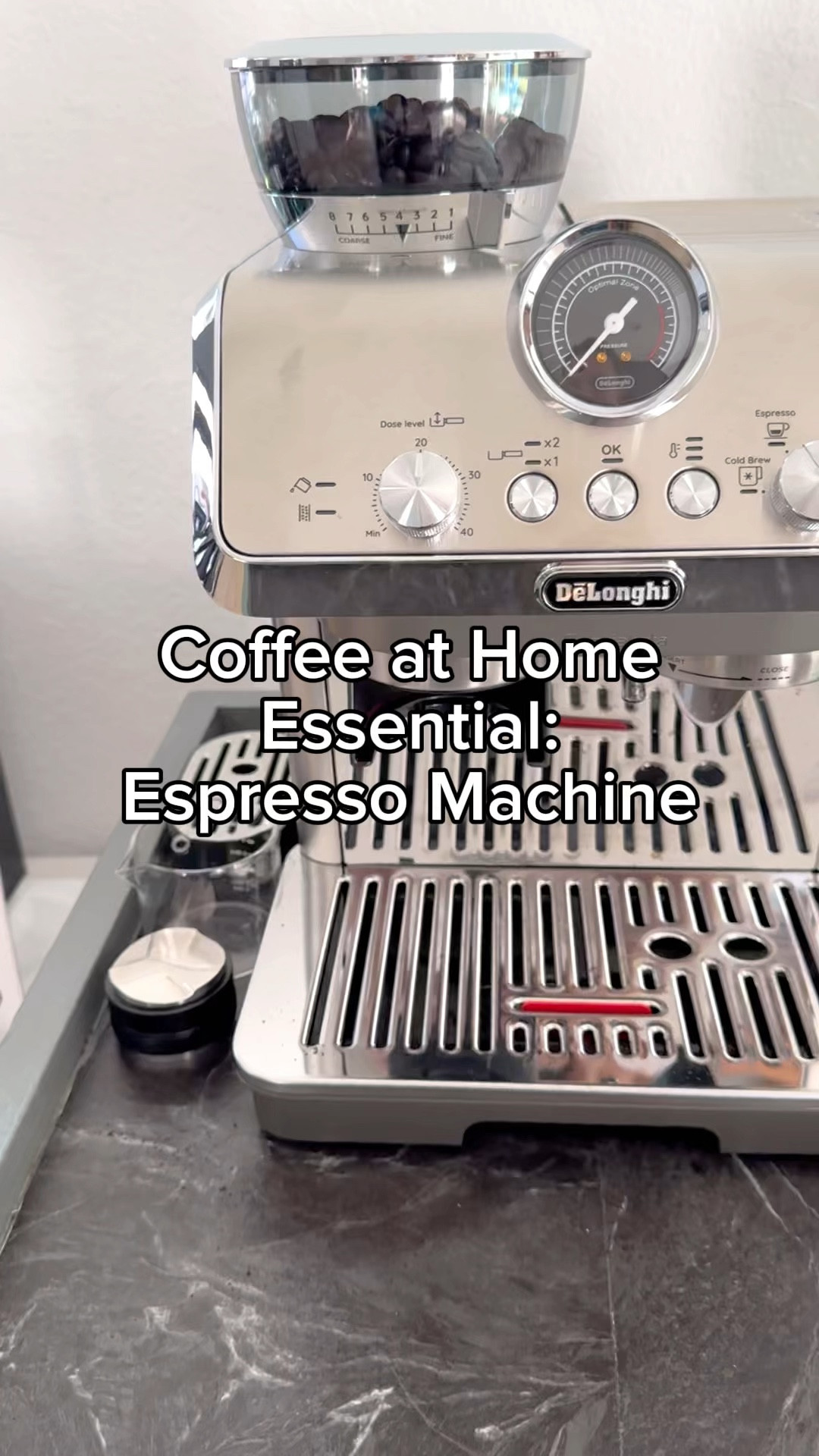 Coffee at home essential: espresso machine. 

DeLonghi La Specialista has everything to make the perfect espresso or espresso drink at home. I love that it has a cold brew option as well! 

#LTKVideo #LTKHome