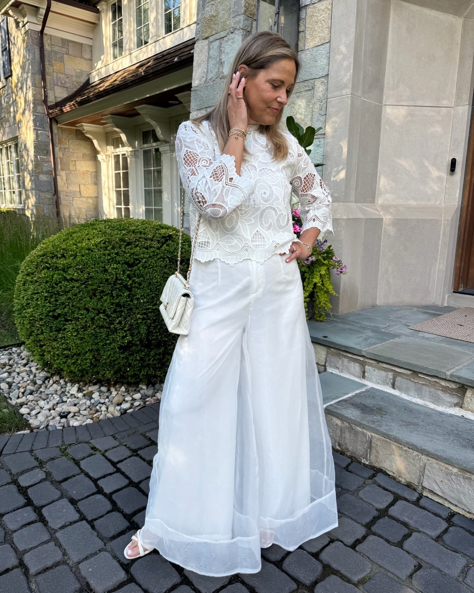 I am obsessed with this all white ensemble! It’s super chic and clean for any occasion. These pants are very elegant! s

#LTKOver40 #LTKMidsize #LTKSeasonal