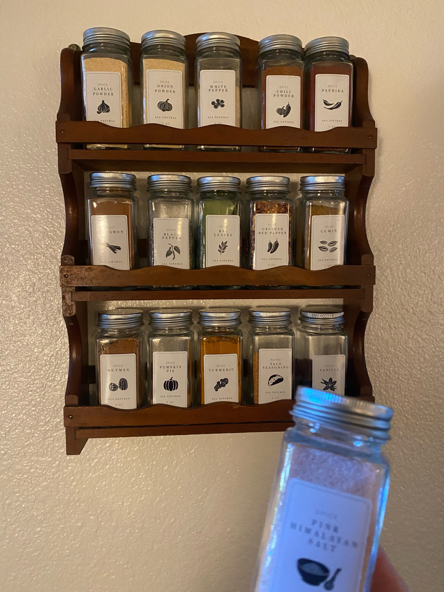 An antique spice rack & aesthetically pleasing jars & labels here 

#LTKFind #LTKhome