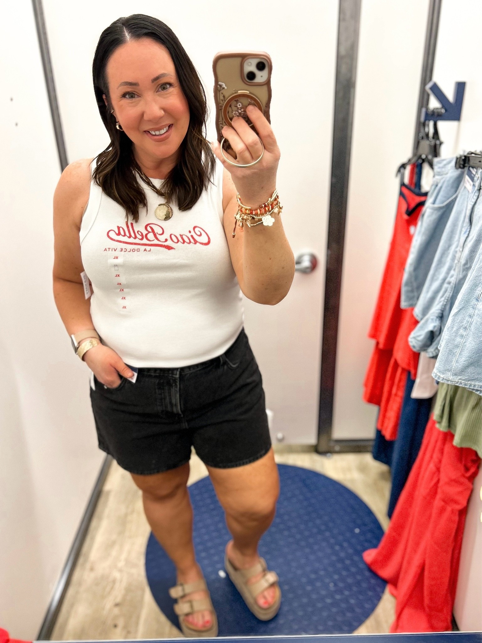 XL graphic tank! Size 16 denim shorts. Both on sale this week!

#LTKMidsize #LTKOver40 #LTKSaleAlert