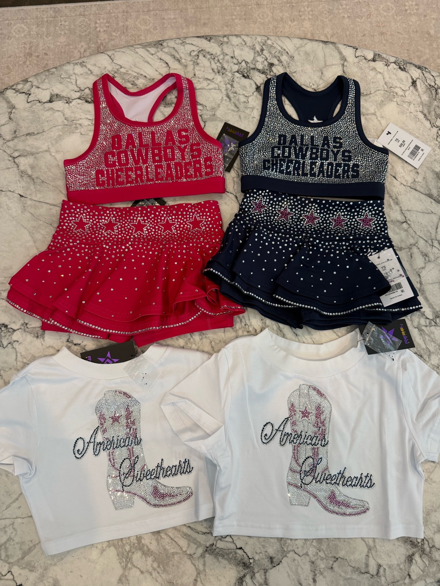 Calling all little Cowboys fans! ⭐️🤍💙 what our girls are wearing to DCC CAMP next week

These rhinestone sets are even cuter in person! From the sparkle to the matching skirts and tees, they’re perfect for game days, cheer, or showing your Dallas pride all season long. ✨🏈

Everything is linked in my LTK!

#DallasCowboys #GameDayStyle #KidsFashion #DallasMoms

#LTKKids #LTKootd #LTKmomlife #LTKKids