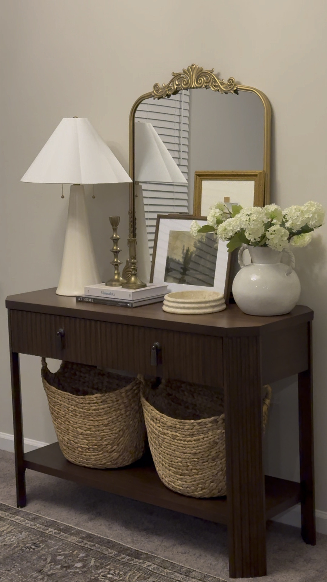 Console table styling, console table, console table decor, neutral console table, ceramic vase, spring florals, spring stems, vintage taper holders, woven baskets, moody artwork, moody wall art, coffee table books, vintage mirror, affordable home decor, affordable home finds, target style, target home, target finds, amazon finds, Walmart finds, Etsy wall art, Amazon home, Aldi finds, neutral home decor, neutral home, interior design, neutral style

#LTKstyletip #LTKSeasonal #LTKhome