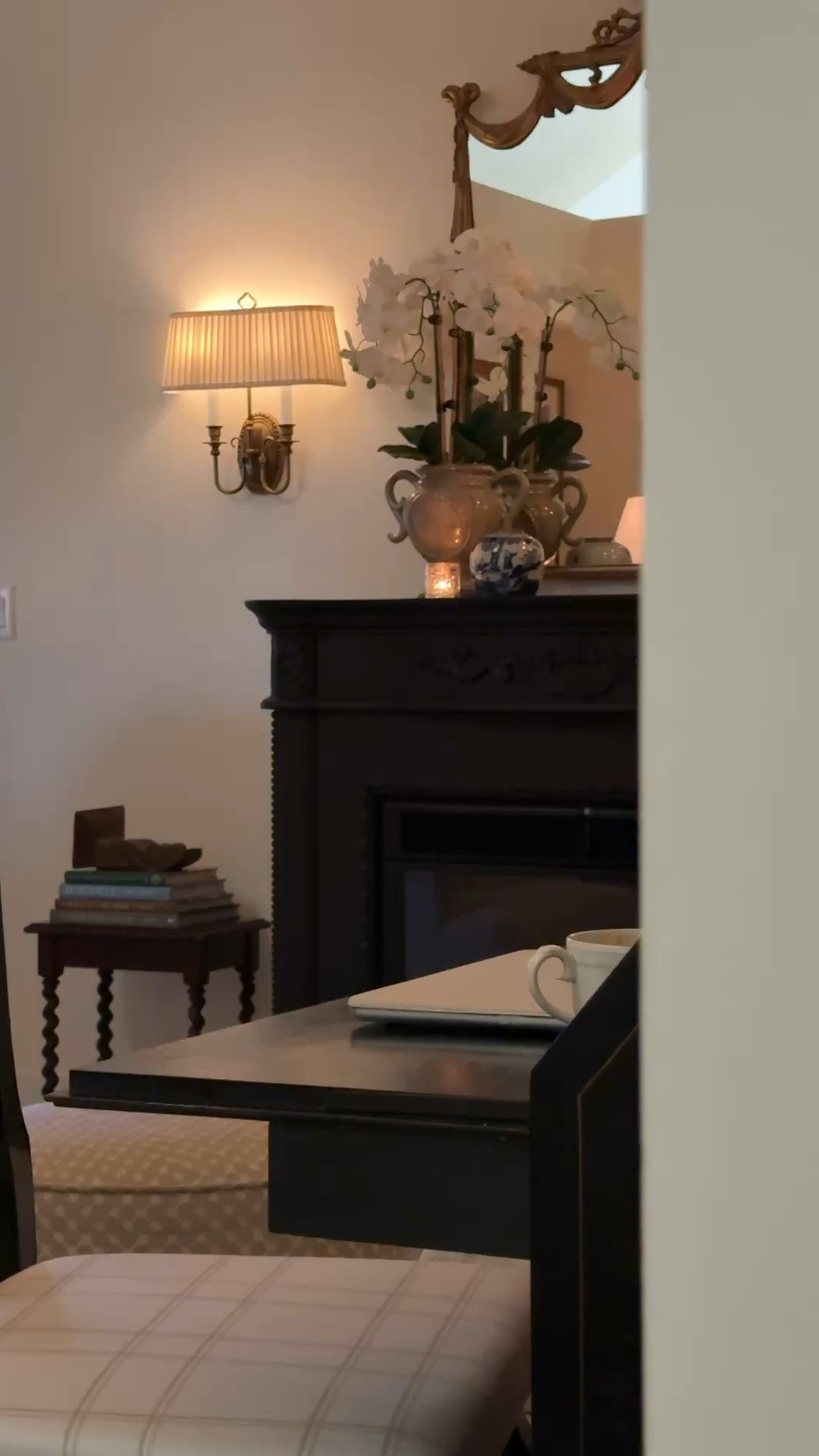 A few timeless details in my sitting room. Linking similar barley twist accent tables, a double wall sconce, mercury glass votive, and faux orchid for that collected, layered look.

#LTKHome